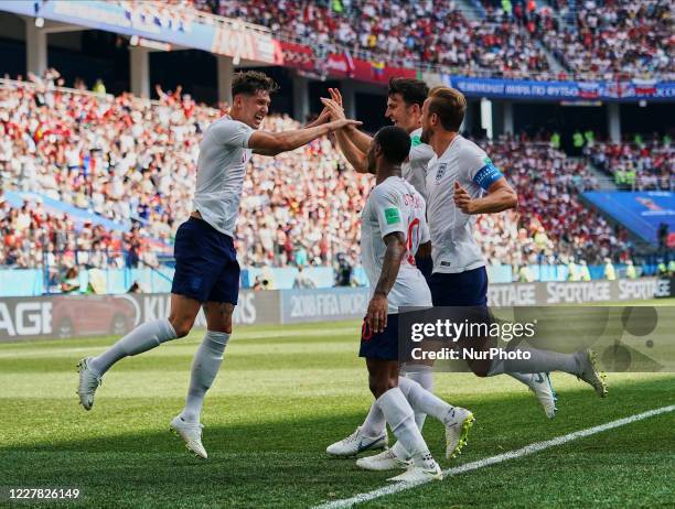 Harry Kane of England and John Stones of England celerbrates the goal to 4-0 in the 40th minute during the FIFA World Cup match England versus Panama...