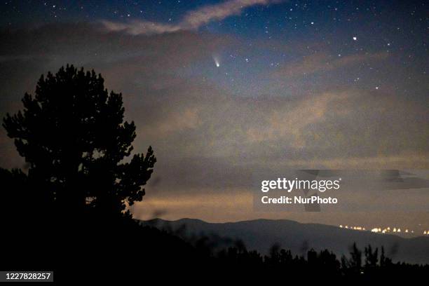 Comet NEOWISE as seen during the night from Olympus Mountain the mythical mountain in Ancient Greek culture, near Petrostrouga refuge at the trail...