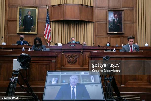 Jeff Bezos, founder and chief executive officer of Amazon.com Inc., pauses while speaking via videoconference during a House Judiciary Subcommittee...