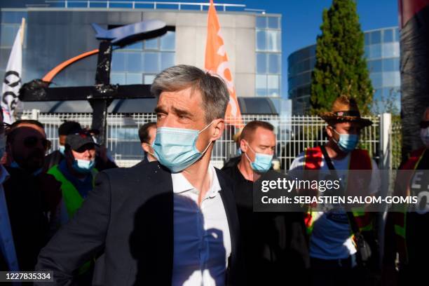 French president of regional low cost airline HOP!, branch of Air France, Pierre-Olivier Bandet arrives during a protest against a restructuration...