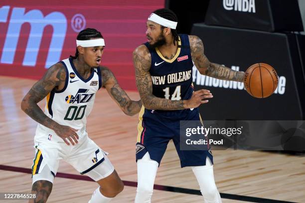 Donovan Mitchell of the Utah Jazz drives to the basket against the New Orleans Pelicans during the first half at HP Field House at ESPN Wide World Of...