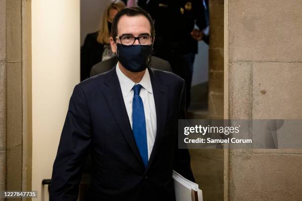 Treasury Secretary Steven Mnuchin leaves the U.S. Capitol after speaking to reporters outside of Speaker of the House Nancy Pelosis office following...