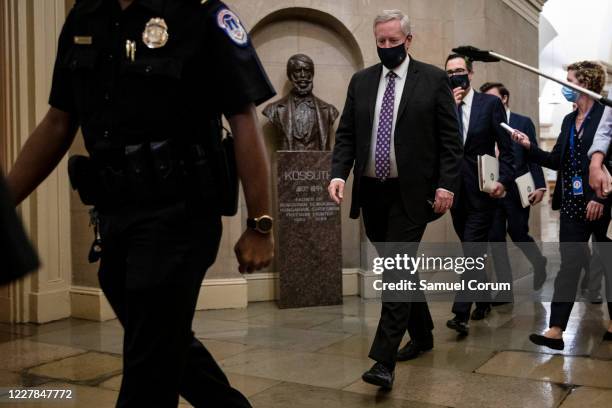 Treasury Secretary Steven Mnuchin and White House Chief of Staff Mark Meadows leave the U.S. Capitol after speaking to reporters outside of Speaker...