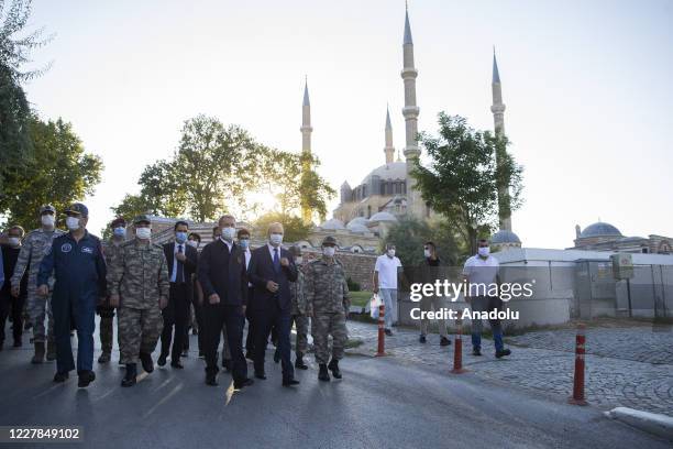 Turkish Defense Minister Hulusi Akar accompanied by Turkish Chief of General Staff Gen. Yasar Guler, Turkish Land Forces Commander Gen. Umit Dundar,...