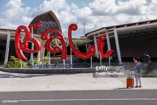 Passengers arrives as Bali's tourism reopen for domestic visitors at I Gusti Ngurah Rai International Airport in Kuta, Bali, Indonesia on July 31...