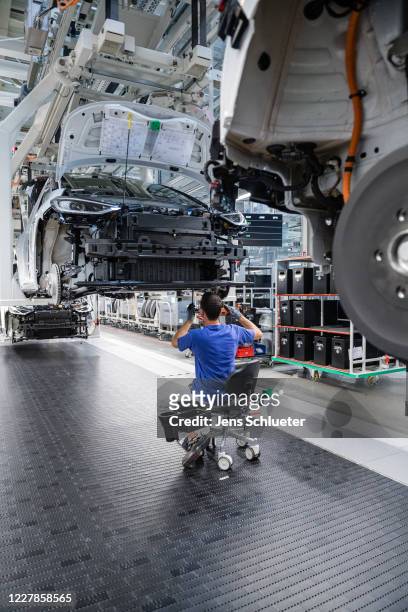 Worker assemble VW ID.3 electric cars at the Volkswagen factory on July 31, 2020 in Zwickau, Germany. Volkswagen has started taking orders for the...