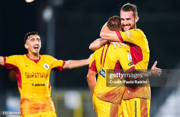 Giuseppe Panico of Cittadella celebrates with his team-mates Alberto Rizzo and Domenico Frare after scoring his second goal during the Serie B match...