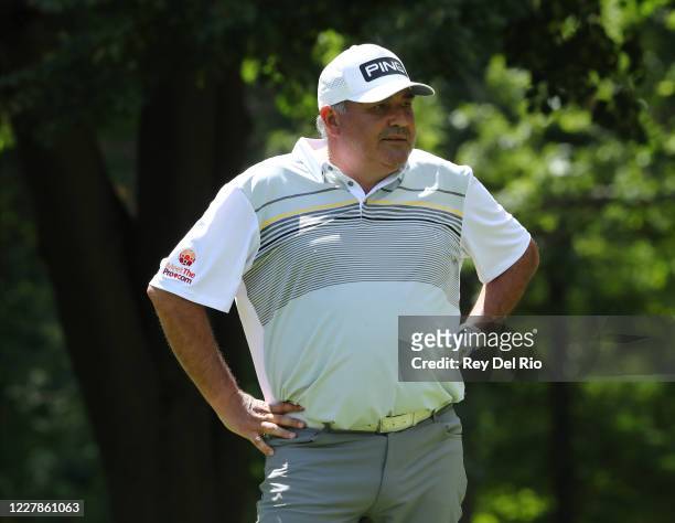 Angel Cabrera of Argentina reacts to his shot from the eighth tee during the first round of the Ally Challenge presented by McLaren at Warwick Hills...