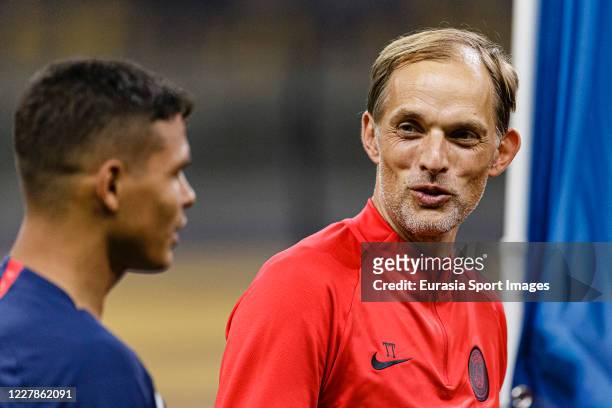 Head Coach Thomas Tuchel talks to Thiago Silva of Paris Saint Germain during the French League Cup final between Paris Saint Germain and Olympique...