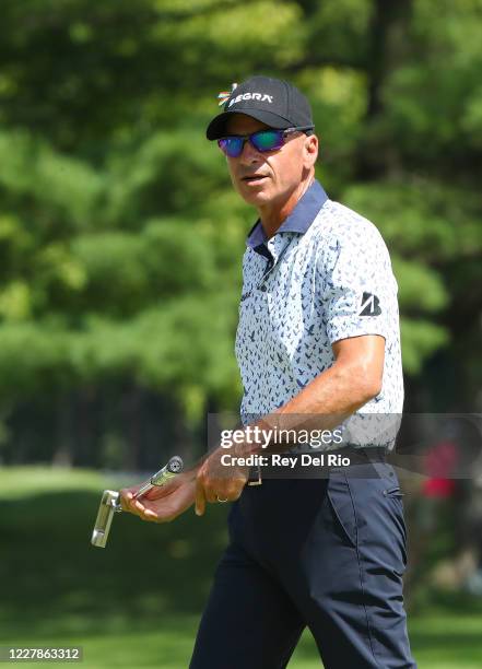 Rocco Mediate of the United States reacts on the ninth green during the first round of the Ally Challenge presented by McLaren at Warwick Hills Golf...
