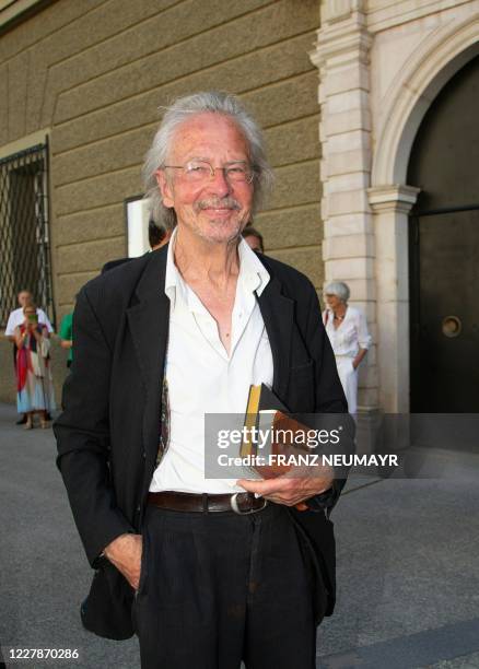 Austrian novelist and playwright Peter Handke poses prior to the performance of "Elektra" that will open the festival on August 1, 2020 at the...