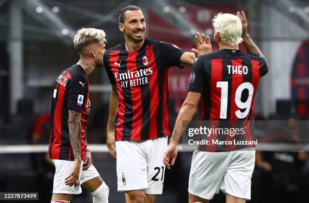 Zlatan Ibrahimovic of AC Milan celebrates after scoring the second goal of his team with his team-mate Theo Hernandez during the Serie A match...