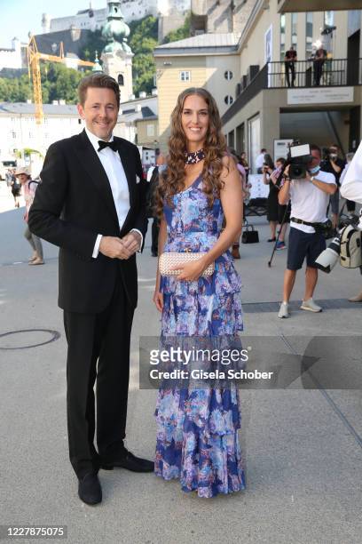 Harald Mahrer and his wife Andrea Samonigg-Mahrer arrive for the premiere of "Elektra" during the opening of the Salzburg Festival 2020 at Salzburg...