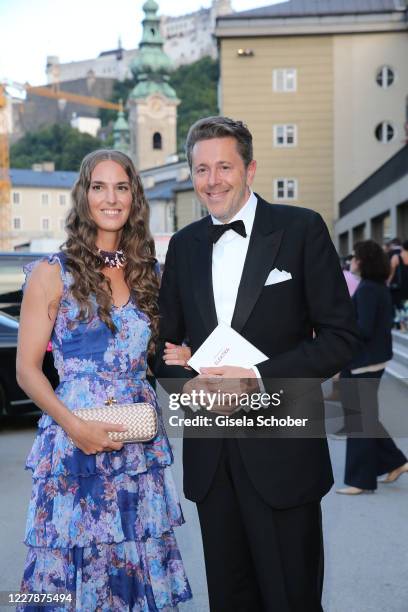 Harald Mahrer and his wife Andrea Samonigg-Mahrer arrive for the premiere of "Elektra" during the opening of the Salzburg Festival 2020 at Salzburg...