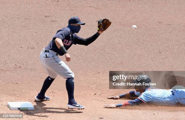 Cesar Hernandez of the Cleveland Indians catches Jorge Polanco of the Minnesota Twins stealing second base during the first inning of the game at...