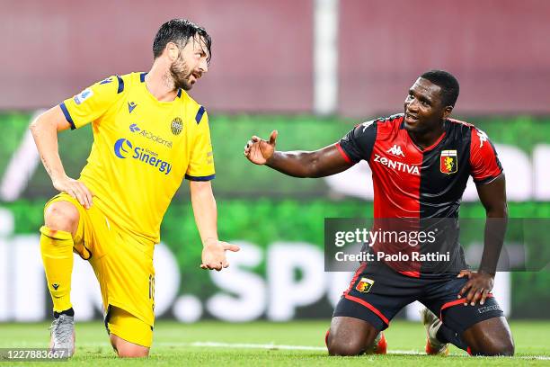 Samuel Di Carmine of Hellas Verona and Cristian Zapata of Genoa chat during the Serie A match between Genoa CFC and Hellas Verona at Stadio Luigi...