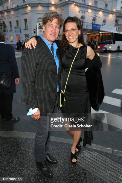Tobias Moretti and his wife Julia Moretti attend the theatre premiere of "Zdenek Adamec" during the Salzburg Festival 2020 at Landestheater on August...