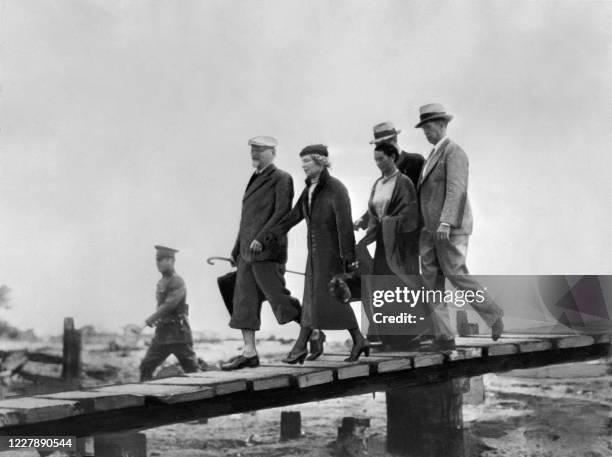 Russian Leon Trotsky , accompagnied by his wife Natalia Sedova , is greeted by Mexican painter Frida Kahlo upon his arrival in Mexico, 24 January...