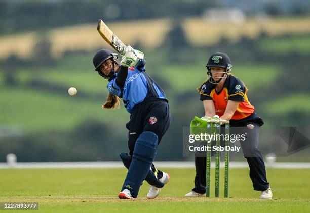 Wicklow , Ireland - 3 August 2020; Amy Hunter of Typhoons plays a shot, watched by Scorchers wicker-keeper Shauna Kavanagh, during the Women's Super...