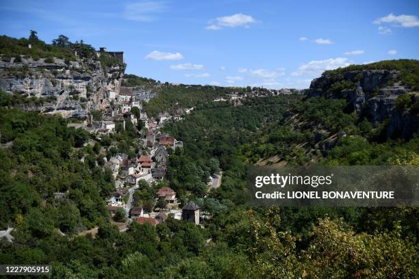 The village of Rocamadour, southern France, is pictured on August 4, 2020. - Rocamadour is well known for its religious city, a complex of religious...