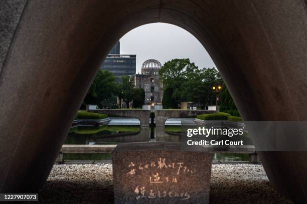 The Atomic Bomb Dome is pictured through the Hiroshima Victims Memorial Cenotaph on August 4, 2020 in Hiroshima, Japan. This Thursday will mark the...