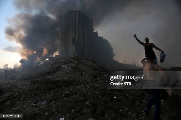 Picture shows the scene of an explosion in Beirut on August 4, 2020. - Two huge explosion rocked the Lebanese capital Beirut, wounding dozens of...