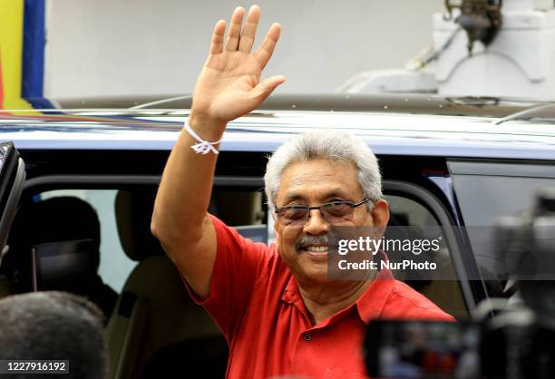 Sri Lankan president Gotabaya Rajapaksa gestures as he leaves after casting his vote for the parliamentary election at a polling station in Colombo,...