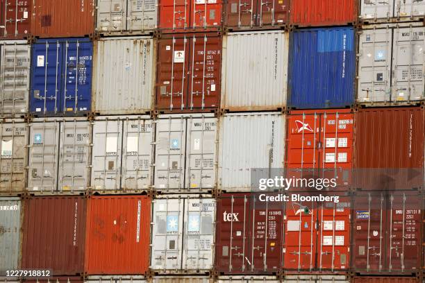 Shipping containers sit stacked at the HHLA Container Terminal Burchardkai at the Port of Hamburg in Hamburg, Germany, on Tuesday, Aug. 5, 2020....