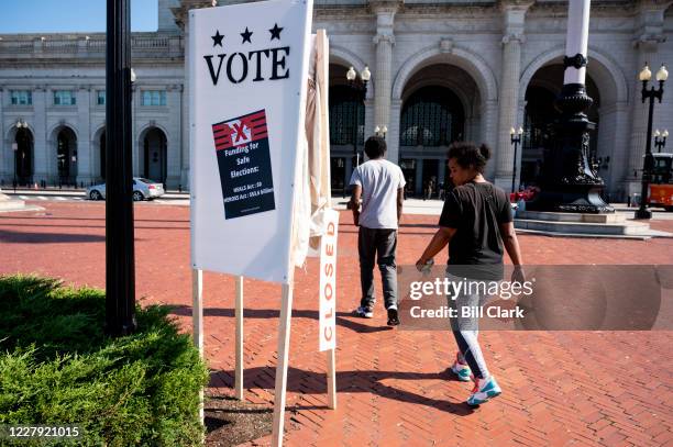 Mock voting booth stand in front of Union Station in Washington on Wednesday, Aug. 5, 2020. Local artists along with Declaration for American...