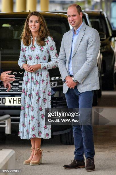 Prince William, Duke of Cambridge and Catherine, Duchess of Cambridgearrive by car to visit beach huts, during their visit to Barry Island, South...