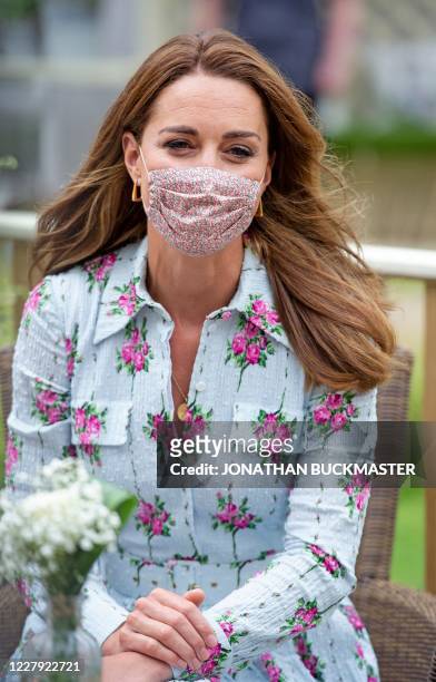 Britain's Catherine, Duchess of Cambridge meets residents at the Shire Hall Care Home in Cardiff on August 5, 2020.