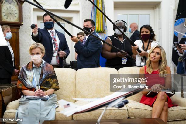 Deborah Birx, coronavirus response coordinator, left and Kayleigh McEnany, White House press secretary, listen during a meeting between U.S....