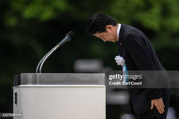 Japanese Prime Minister, Shinzo Abe, bows after making a speech during the 75th anniversary of the Hiroshima atomic bombing, on August 6, 2020 in...