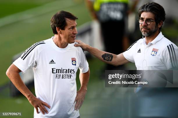 Juninho Pernambucano , sporting director of Olympique Lyonnais, speaks with Rudi Garcia, head coach of Olympique Lyonnais, during Olympique Lyonnais...