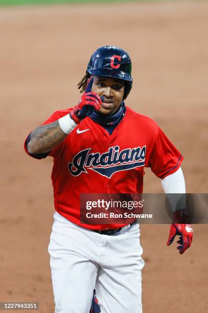 Jose Ramirez of the Cleveland Indians rounds the bases on his two-run home run against relief pitcher Cody Reed of the Cincinnati Reds in the seventh...