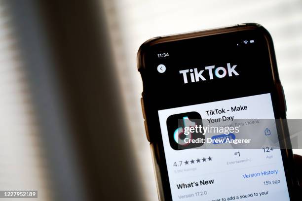 In this photo illustration, the download page for the TikTok app is displayed on an Apple iPhone on August 7, 2020 in Washington, DC. On Thursday...