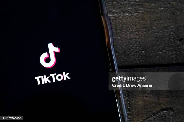 In this photo illustration, the TikTok app is displayed on an Apple iPhone on August 7, 2020 in Washington, DC. On Thursday evening, President Donald...