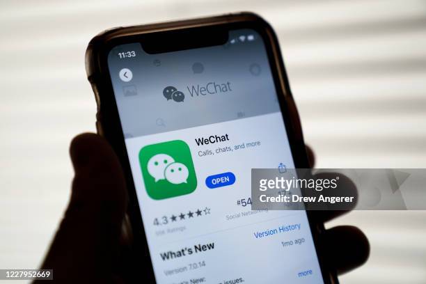 In this photo illustration, the WeChat app is displayed in the App Store on an Apple iPhone on August 7, 2020 in Washington, DC. On Thursday evening,...