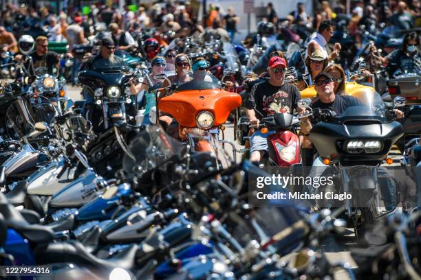 Motorcyclists ride down Main Street during the 80th Annual Sturgis Motorcycle Rally on August 7, 2020 in Sturgis, South Dakota. While the rally...