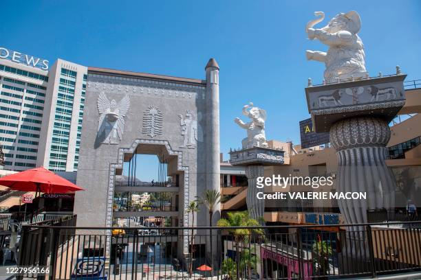 Elephant topped columns and an arch with Babylonian images framing the Hollywood sign in the distance are seen inside the Hollywood & Highland...
