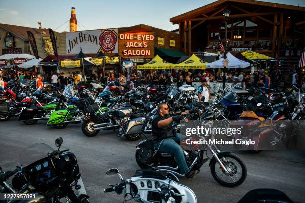 Motorcyclists drive down Main Street during the 80th Annual Sturgis Motorcycle Rally on August 7, 2020 in Sturgis, South Dakota. While the rally...