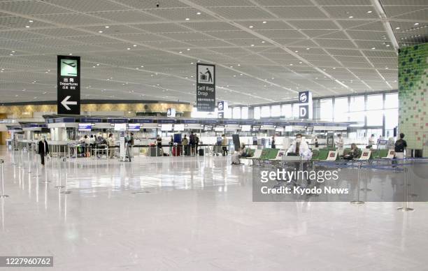 Terminal 1 is deserted at Narita airport near Tokyo on Aug. 8 amid the continued spread of the novel coronavirus.