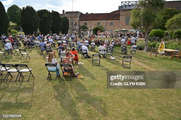 The audience are spread across the garden watching a preview of a socially-distanced opera, a translation of Jacques Offenbachs one-act French farce,...