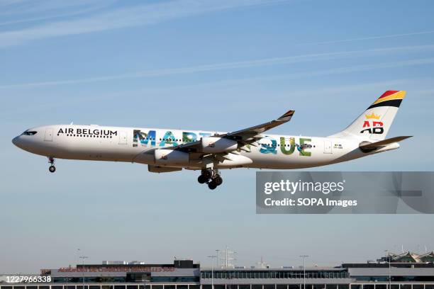 An Air Belgium airbus 340-300 promoting its regular destination to Martinique island is seen landing at Charleroi airport.