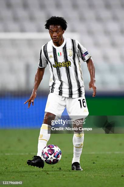 Juan Cuadrado of Juventus FC in action during the UEFA Champions League round of 16 second leg football match between Juventus FC and Olympique...