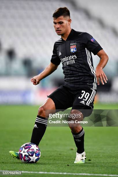 Bruno Guimaraes of Olympique Lyonnais in action during the UEFA Champions League round of 16 second leg football match between Juventus FC and...