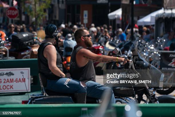 Motorcyclists ride on Main Street during the 80th Annual Sturgis Motorcycle Rally on August 8, 2020 in Sturgis, South Dakota. - Officials estimate...