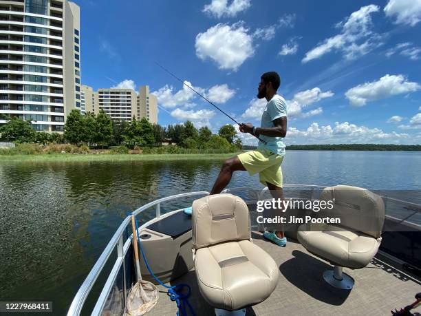 Paul George of the LA Clippers fishing during an off day as part of the NBA Restart 2020 on August 7, 2020 in Orlando, Florida. NOTE TO USER: User...