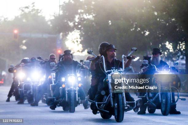 Motorcyclists ride down Lazelle Street during the 80th Annual Sturgis Motorcycle Rally in Sturgis, South Dakota on August 8, 2020. While the rally...