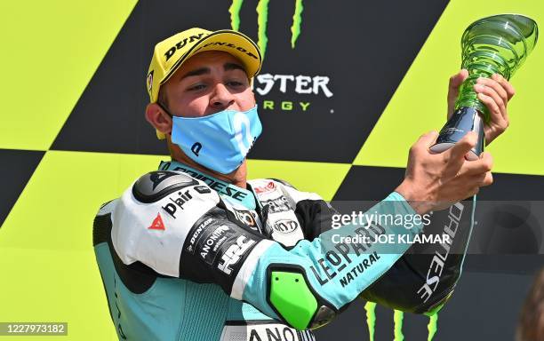 Winner Leopard Racing's Italian rider Dennis Foggia celebrates on the podium after the Moto 3 race of the Czech Grand Prix at Masaryk circuit in Brno...